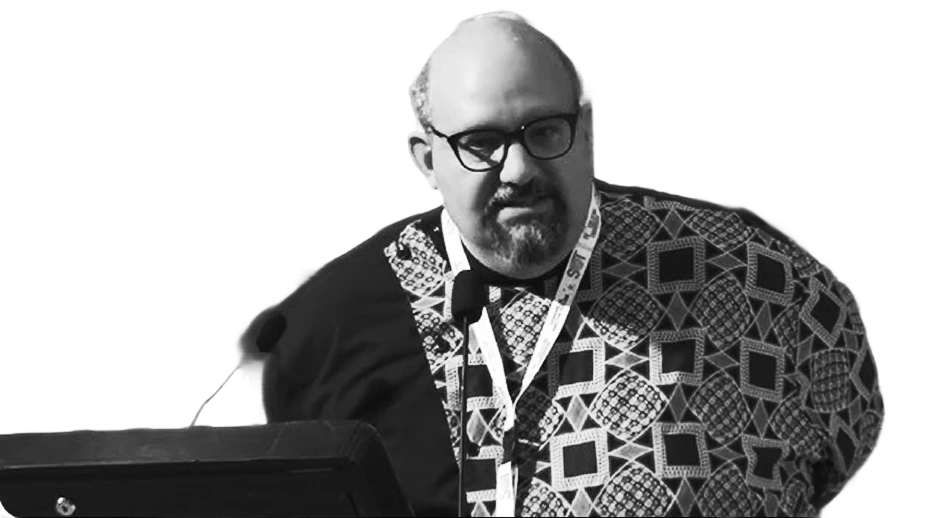 Daniel Sobel speaking at a podium